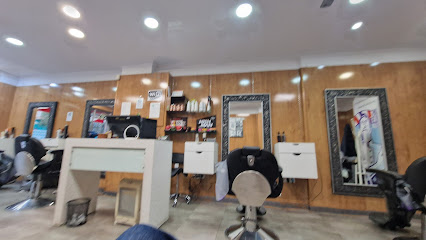 Barberia peluquería Carlos González GRX - Opiniones y contacto